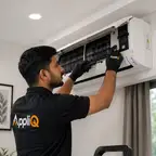 AC technician repairing a unit